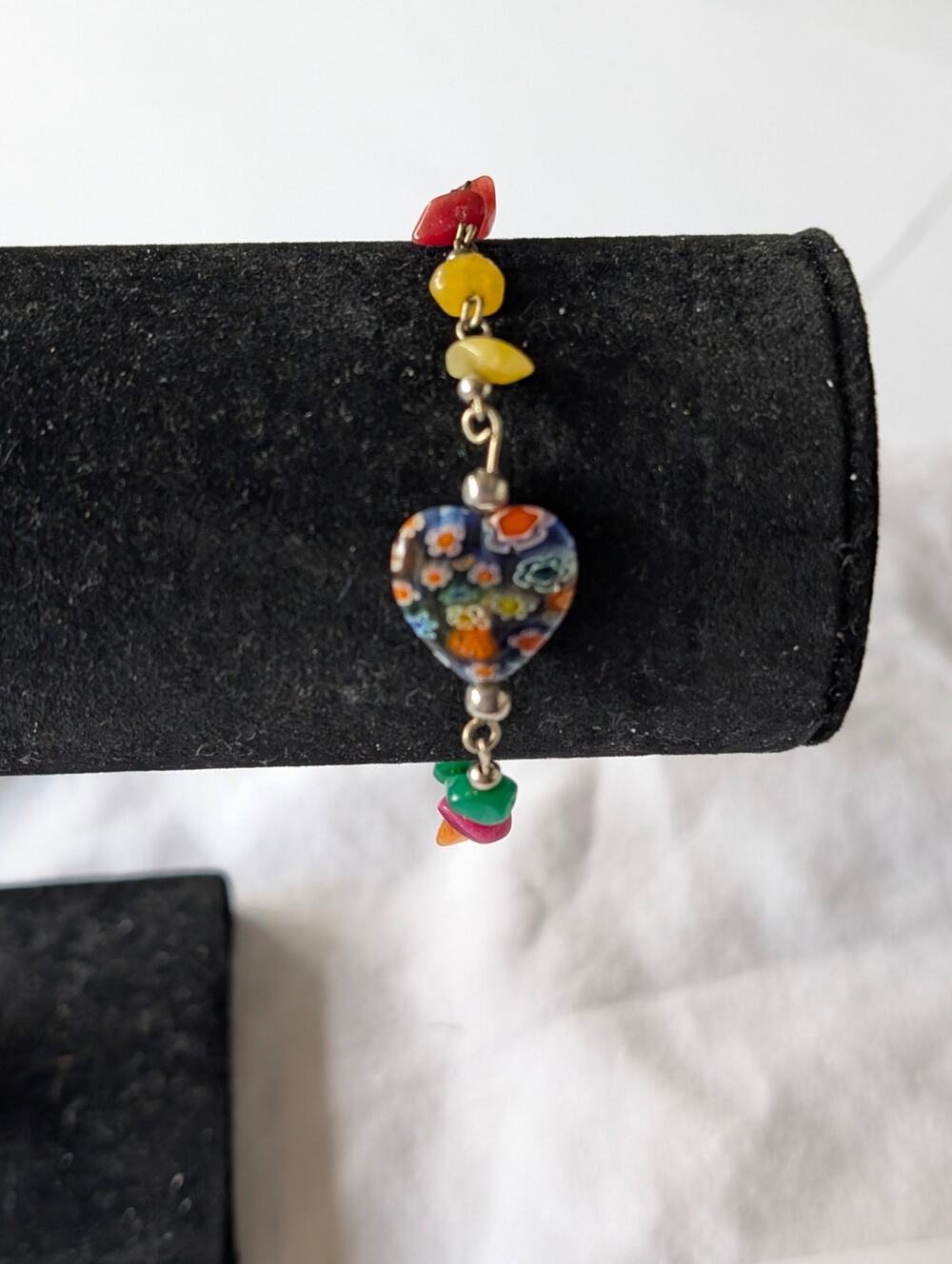 Silver Tone Charm Bracelet With A Millefiori Glass Heart Center Bead